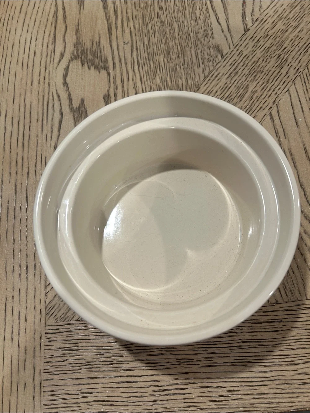 Pottery Barn Cream Ceramic dog bowl with Blue Logo